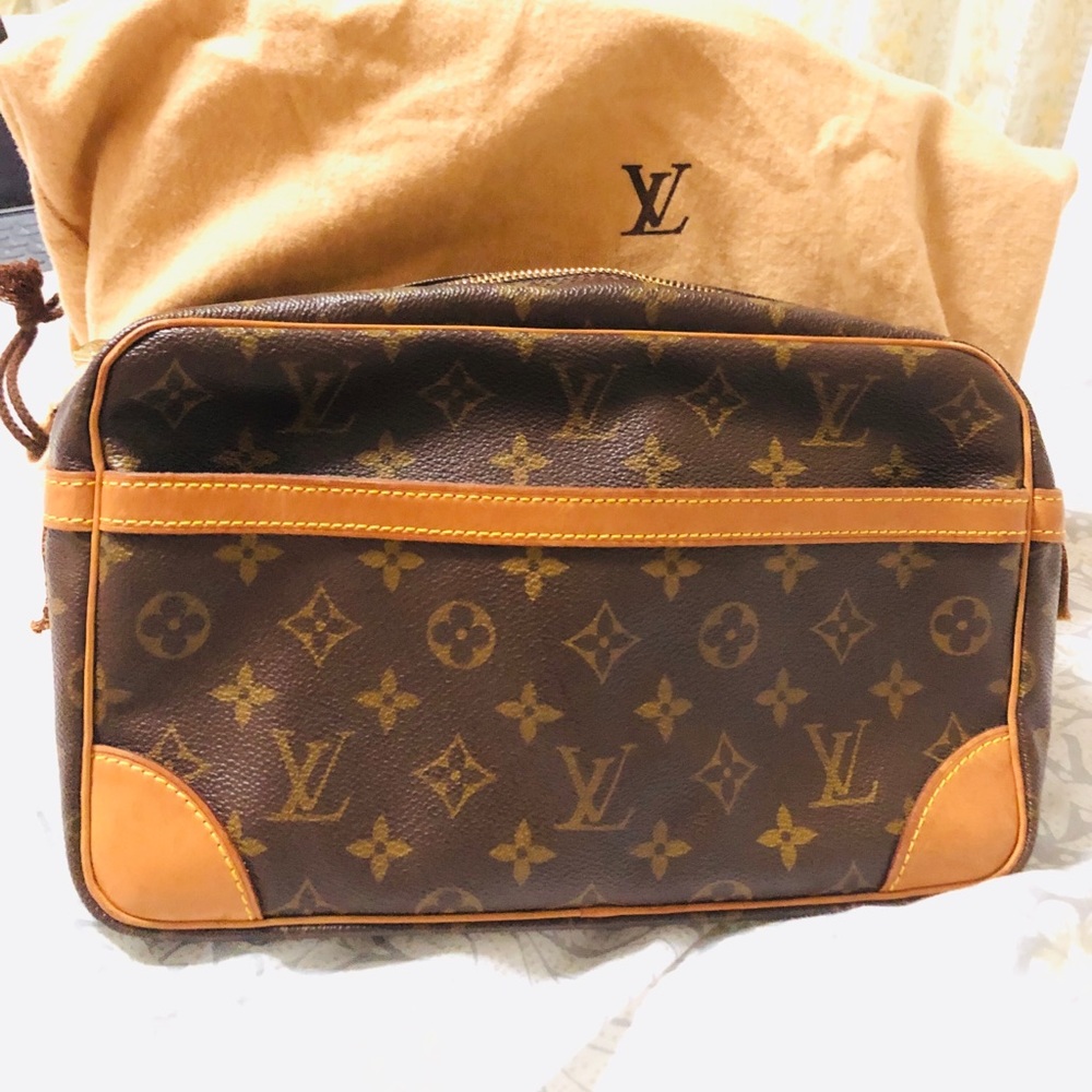 Louis Vuitton clutch and pouch bag.